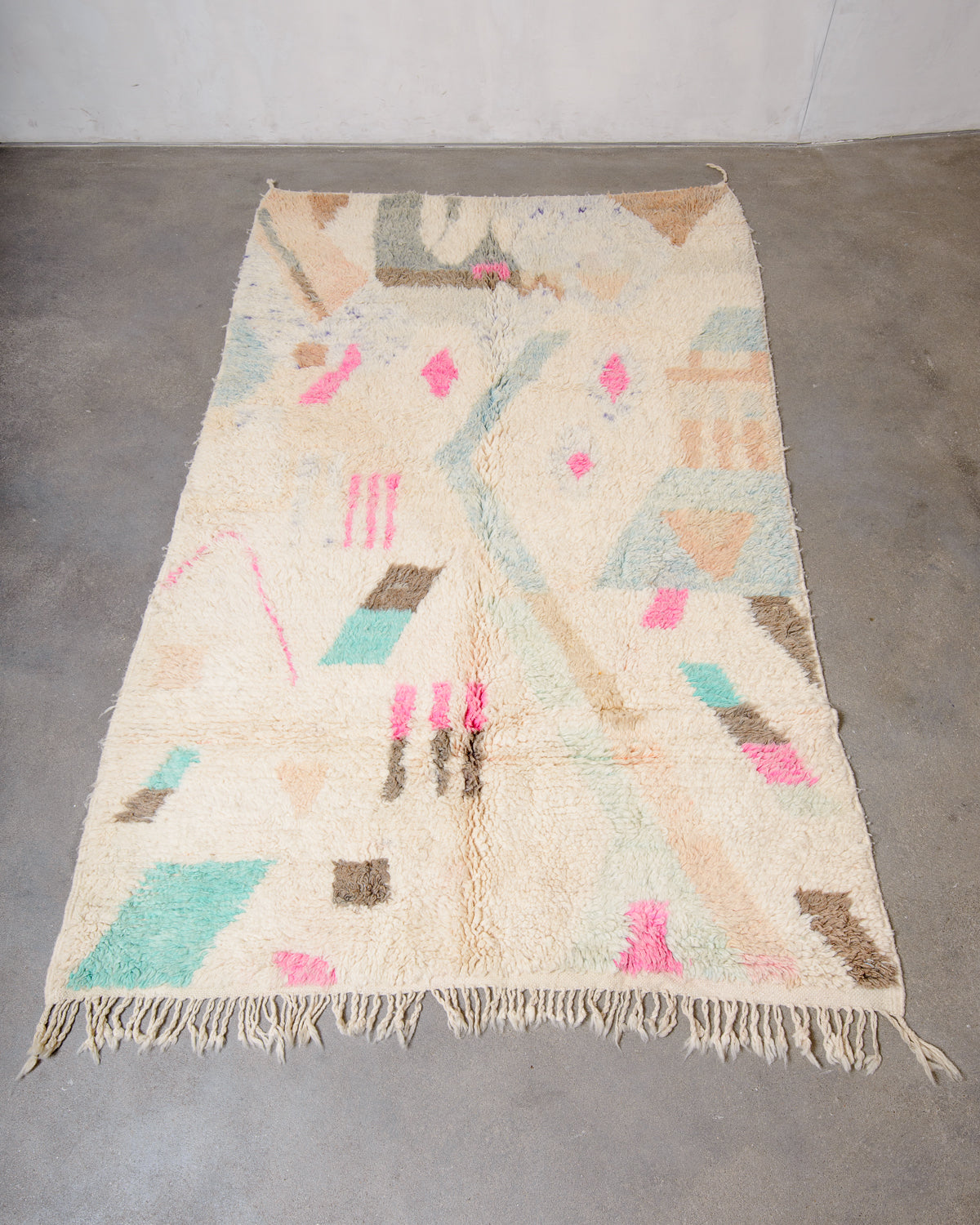 Modern, designer, handcrafted Berber rug from Morocco. Vintage carpet with beautiful colours and patterns and fluffy texture.